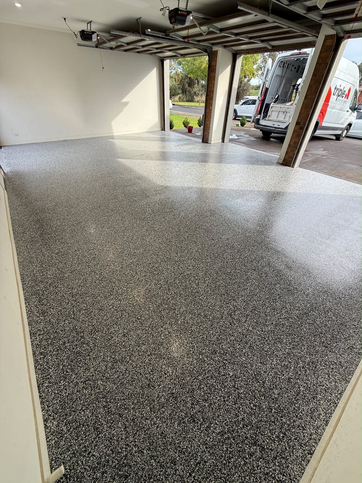 Triple garage floor — after epoxy coating